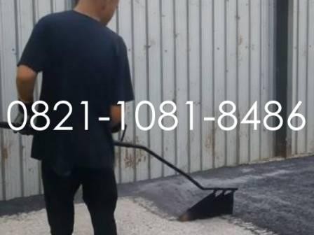 semprot aspal melalui hand sprayer